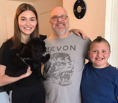 Arnold Cabe with his daughter Grace and son Duke.